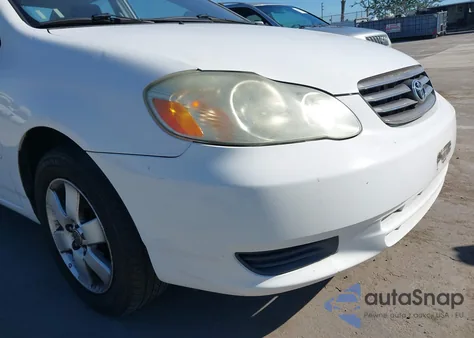 2003 Toyota Corolla Le z USA, uszkodzony, nr VIN JTDBR32E630013221